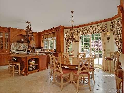 Traditional kitchen with butcher block island – Marina Interiors