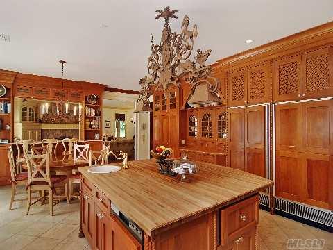 Traditional kitchen with butcher block island